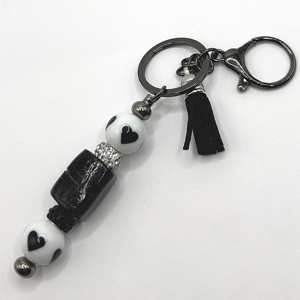 Keyring with Chunky Black Bead and White-Black Heart Accents