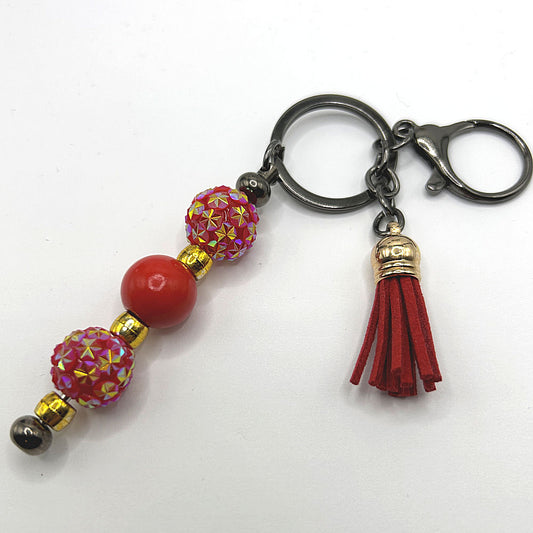 Keyring with Red Sparkles, Wood, and Golden Accents